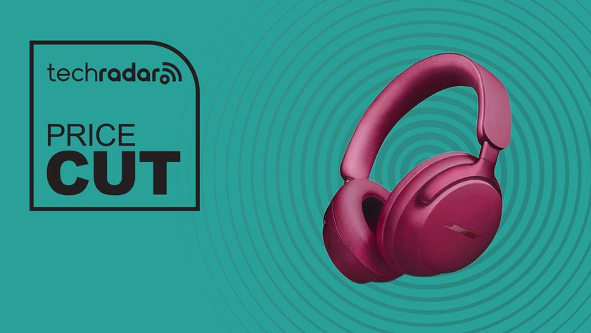 Bose QuietComfort Ultra Headphones on teal background with the words &#039;TechRadar: price cut&#039;