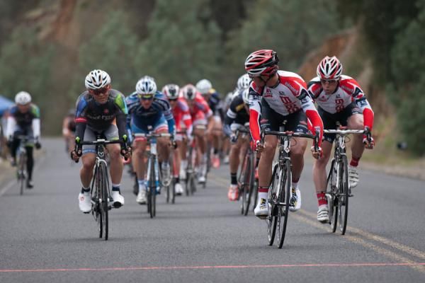 Patrick Bevin (Bissell) has enough distance in his winning sprint in the to check on Logan Loader (Exergy) who claimed third.