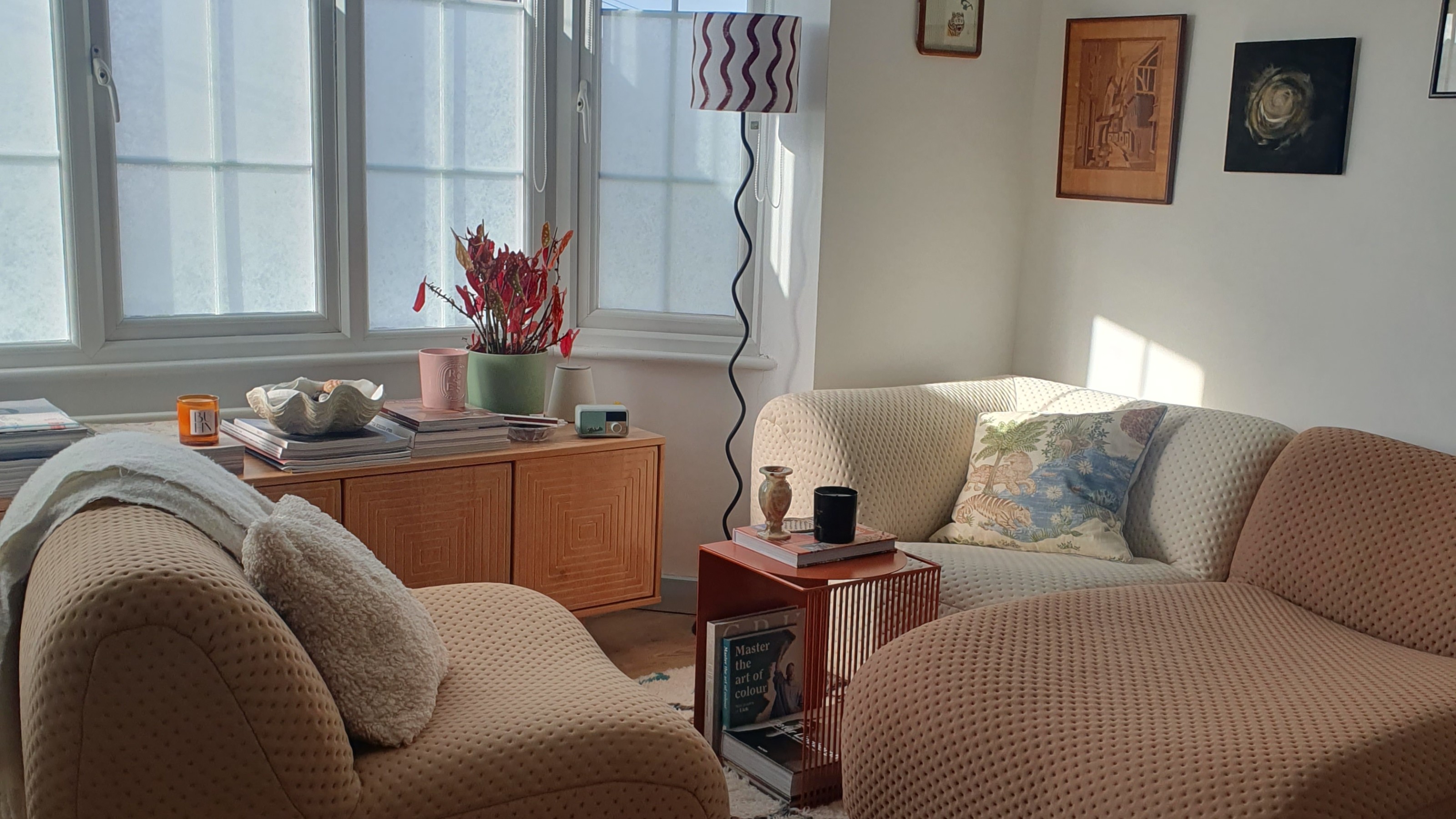 A living area with a multicoloured King Living 1977 modular sofa