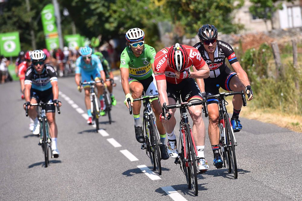Andre Greipel, John Degenkolb, Peter Sagan and Mark Cavendish roll along following an intermediate sprint.