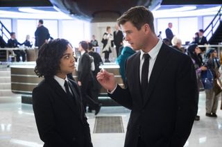 Tessa Thompson and Chris Hemsworth in Men In Black: International.