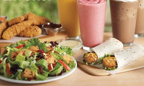 Burger King is giving its menu a healthy makeover, adding salads, wraps, and fruit smoothies alongside its calorie-heavy Whopper.