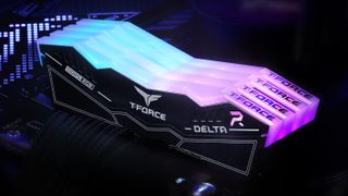 A set of TeamGroup T-Force Delta RGB DDR5 RAM modules in a motherboard