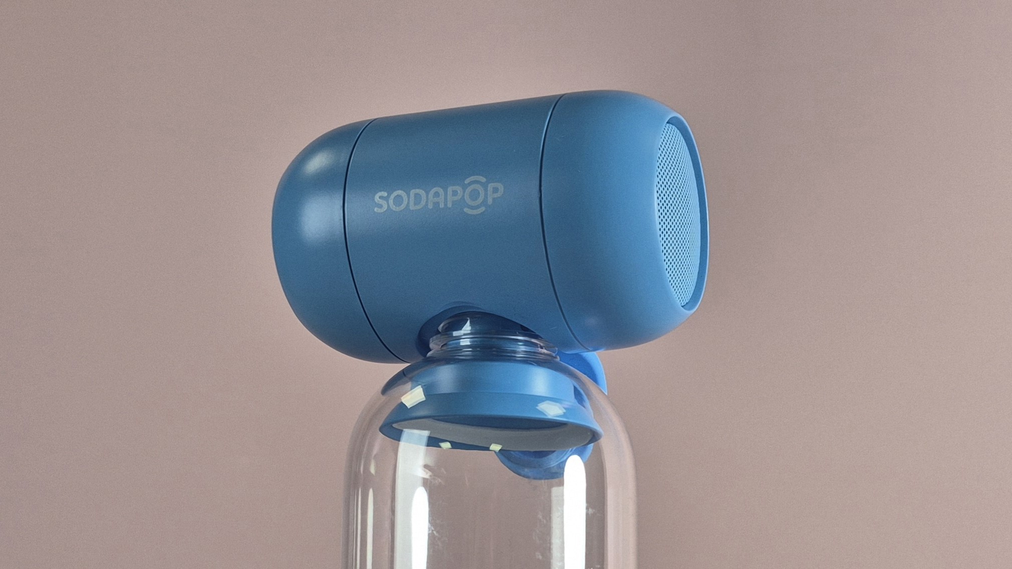 Sodapop Bluetooth speaker screwed on bottle top