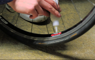 Inserting sealant can be a little messy, but is easier than fitting most tubeless tyres