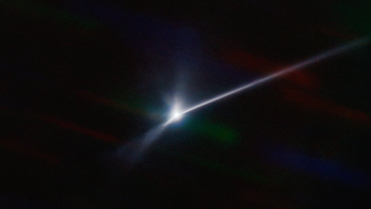 A bright splotch with long ray stretching to the right