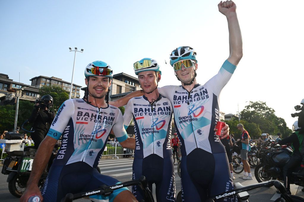 NANNING CHINA OCTOBER 20 LR Robert Stannard of Australia Finlay Pickering of The United Kingdom and stage winner Matevz Govekar of Slovenia and Team Bahrain Victorious react after the 5th GreeTour of Guangxi 2024 Stage 6 a 134km stage from Nanning to Nanning UCIWT on October 20 2024 in Nanning China Photo by Dario BelingheriGetty Images