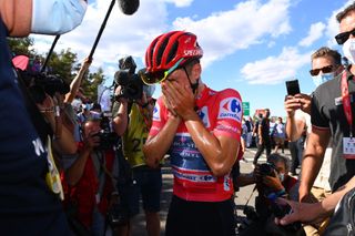 NAVACERRADA SPAIN SEPTEMBER 10 Remco Evenepoel of Belgium and Team QuickStep Alpha Vinyl Red Leader Jersey gets excited knowing hes the final winner after the 77th Tour of Spain 2022 Stage 20 a 181km stage from Moralzarzal to Puerto de Navacerrada 1851m LaVuelta22 WorldTour on September 10 2022 in Puerto de Navacerrada Spain Photo by Tim de WaeleGetty Images