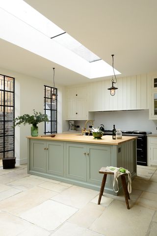 how to choose kitchen flooring modern kitchen with natural stone tiles by deVOL