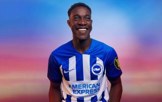 Danny Welbeck models the Brighton & Hove Albion home kit for 2023/24