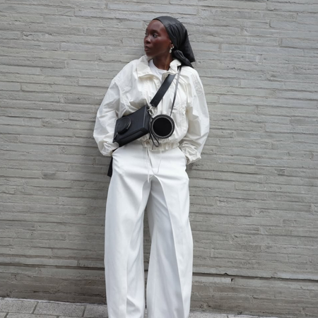 Danielle in a white technical jacket