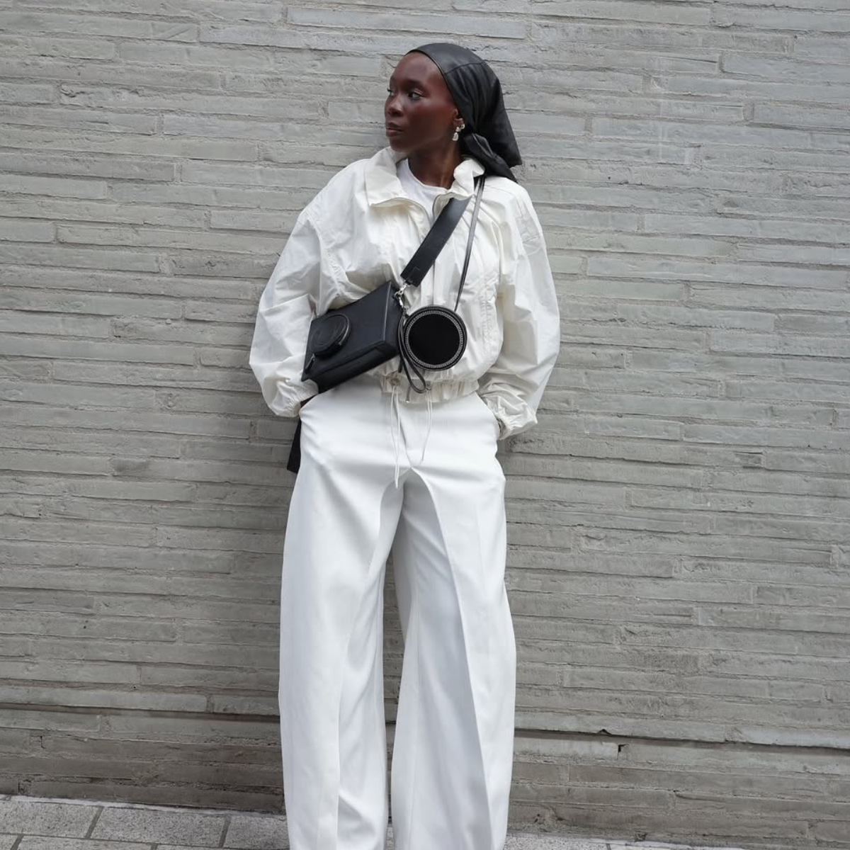 Danielle in a white technical jacket