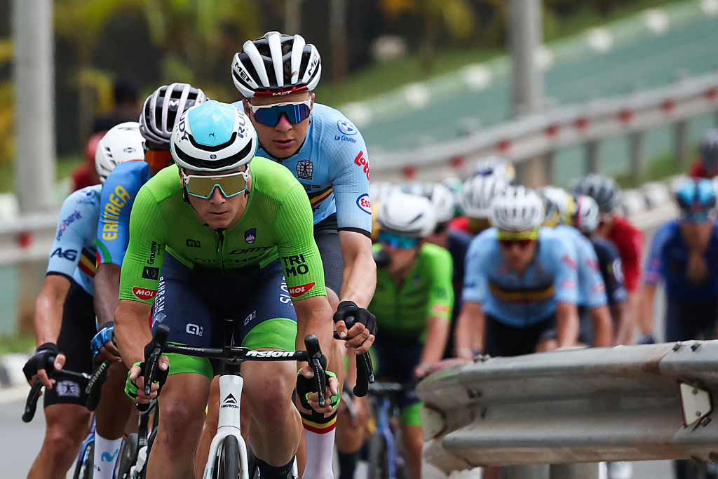 A Slovenian team member leads the pack of riders (peloton) in the men&#039;s Elite road race cycling event during the UCI 2025 Road World Championships, in Kigali, on September 28, 2025. (Photo by Anne-Christine POUJOULAT / AFP)