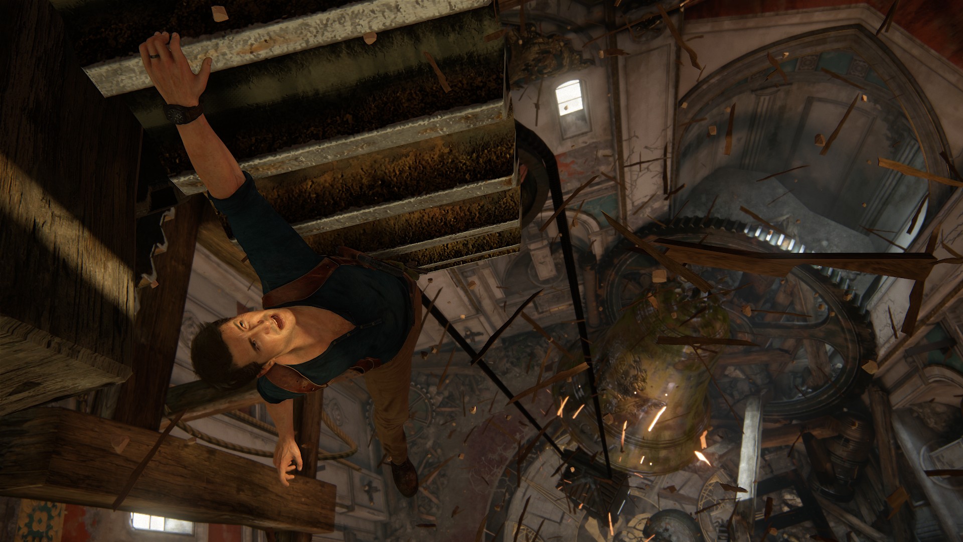 Nathan Drake dangles from a clocktower's cog in Uncharted 4