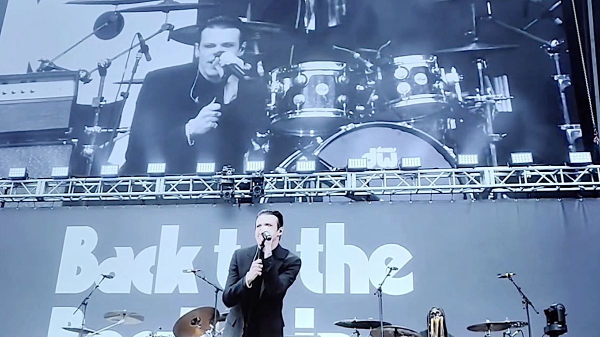 A live performance moment with Yungblud on stage, symbolizing the authentic spirit of rock music.