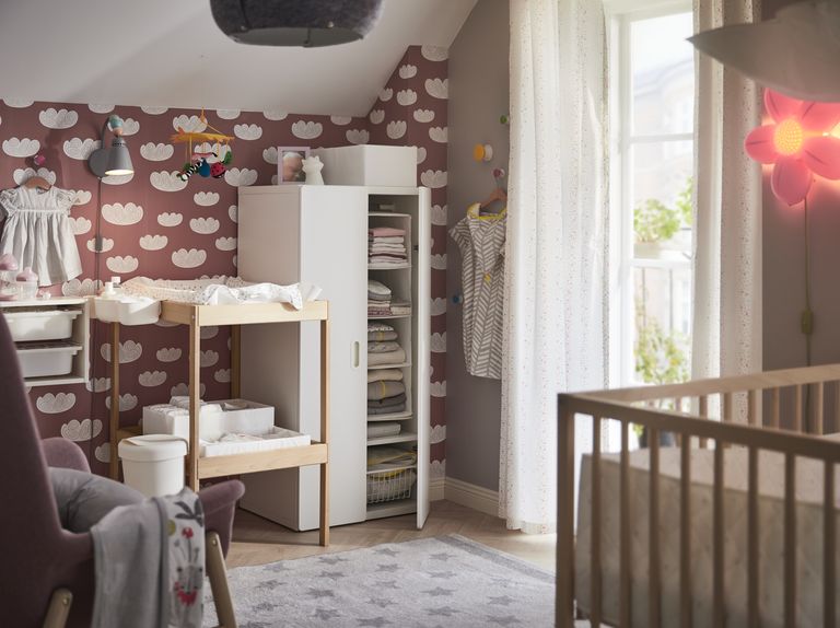 Ikea baby nursery with a snigler changing table