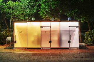 warm coloured shigeru ban design by tokyo toilet project