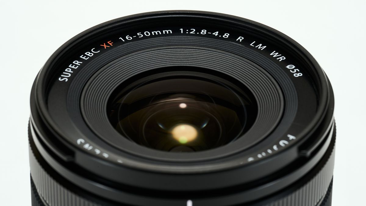 Fujifilm XF 16-50mm f/2.8-4.8 R LM WR lens against a plain light background