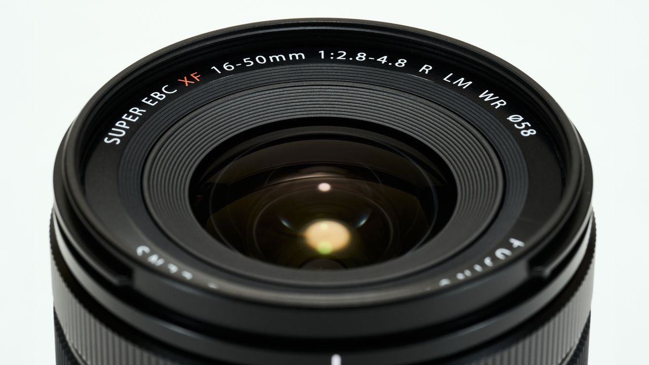 Fujifilm XF 16-50mm f/2.8-4.8 R LM WR lens against a plain light background
