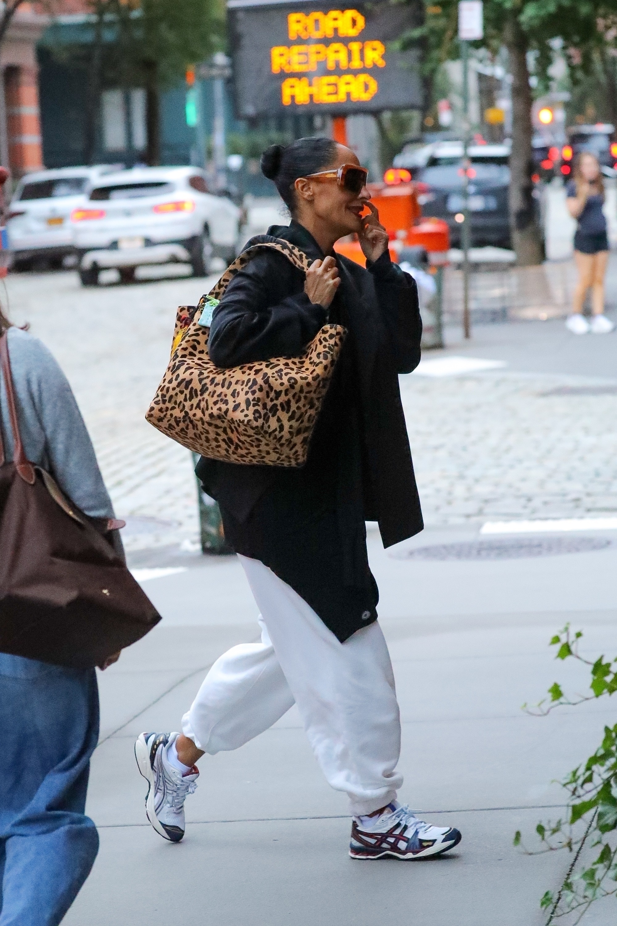 Tracee Ellis Ross was spotted in rare Asics sneakers and a leopard-print tote bag