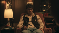 Michael Johnston sitting down in terror in Obsession
