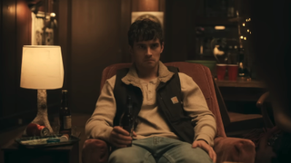 Michael Johnston sitting down in terror in Obsession