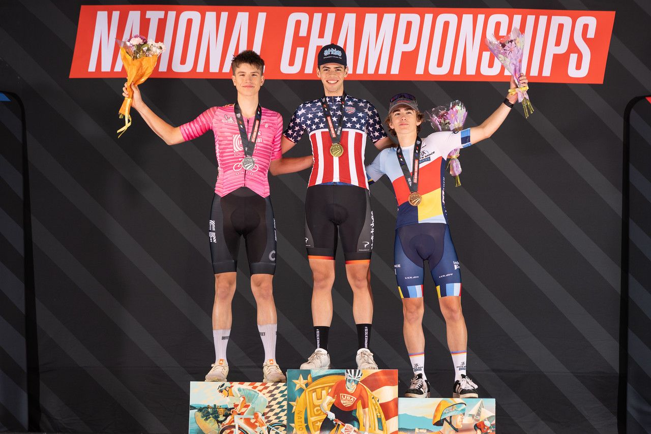 Enzo Edmonds atop the podium of the men's junior criterium race at USA Pro Road Championships 2025
