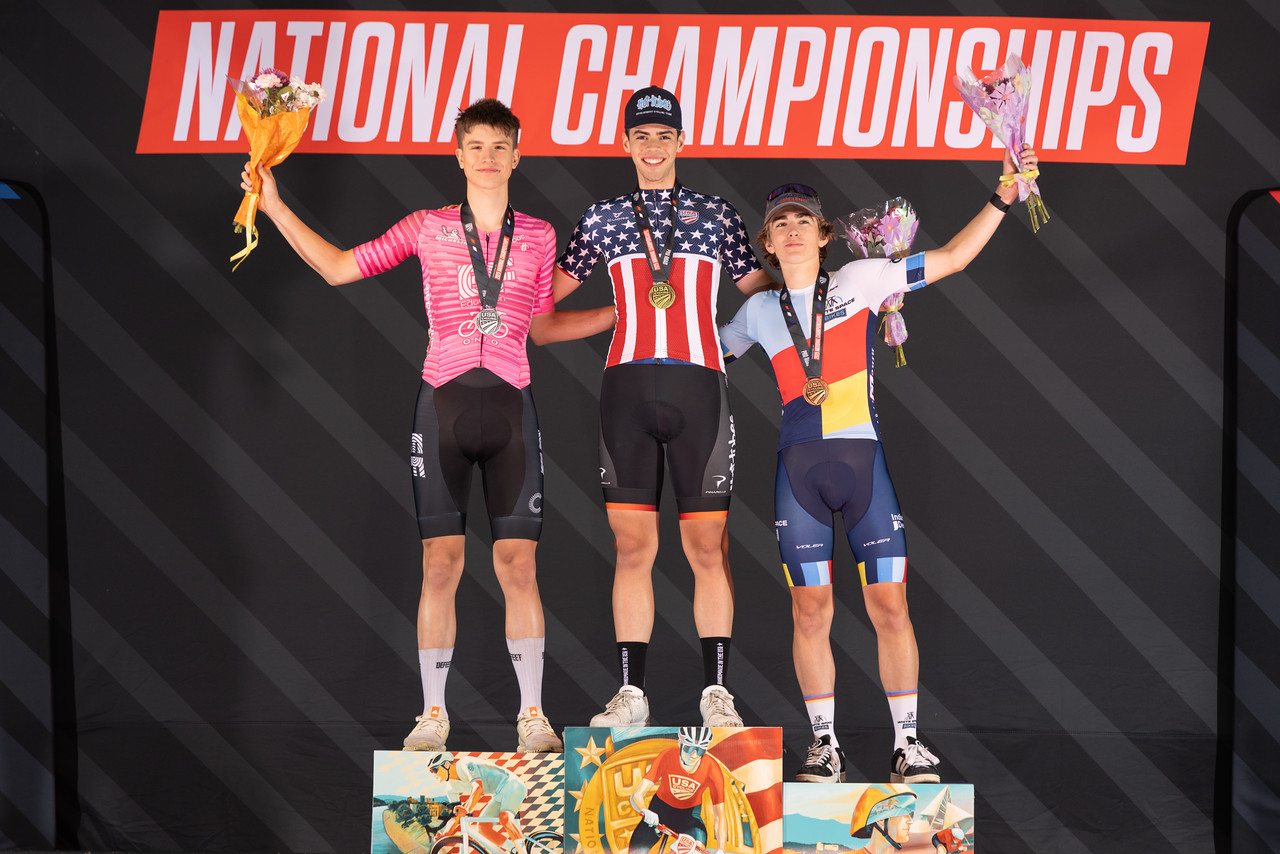 Enzo Edmonds atop the podium of the men's junior criterium race at USA Pro Road Championships 2025