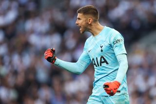 Guglielmo Vicario of Tottenham Hotspur celebrates after the team's victory during the Premier League match between Tottenham Hotspur and Manchester United at Tottenham Hotspur Stadium on August 19, 2023 in London, England.