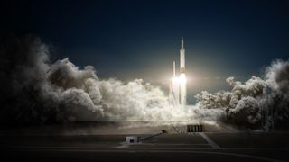 SpaceX will launch two paying passengers on a private flight around the moon in late 2018, the company's founder Elon Musk said Monday, Feb. 27, 2017. The mission would launch on a SpaceX Falcon Heavy seen here in this artist's illustration and take about
