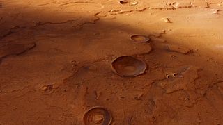 Craters on Mars (between Acidalia Planitia and Tempe Terra) show evidence of past meteorite crashes on the Red Planet.