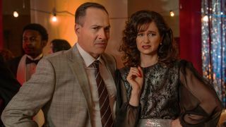 Chris Klein and Katherine Waterston look disgusted as they chaperone the prom in Fear Street: Prom Queen.