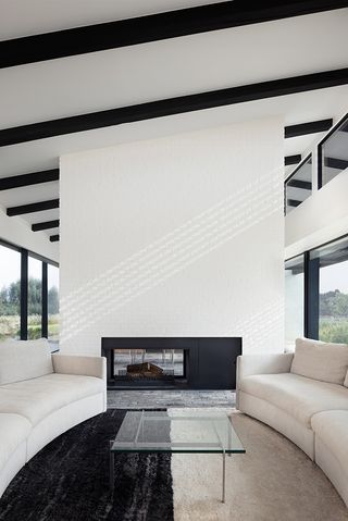 white fireplace in house in the fields
