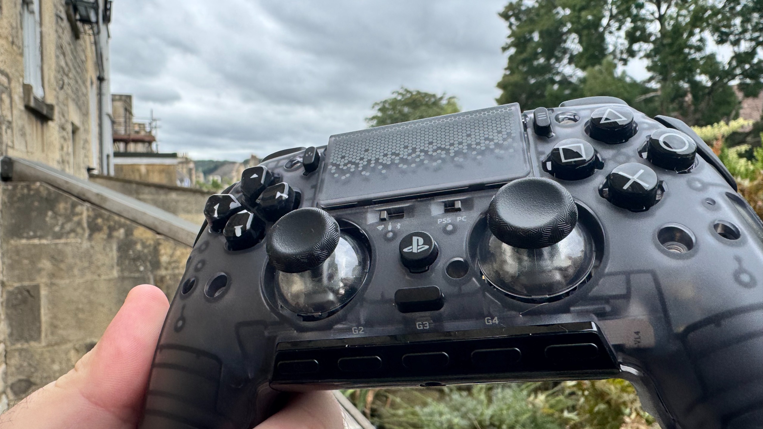 Scuf Omega controller outside, with its faceplate off