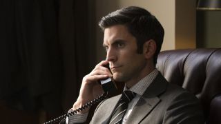Jamie on the phone in office on Yellowstone