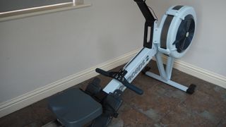 Image shows Concept2 RowErg in a room.