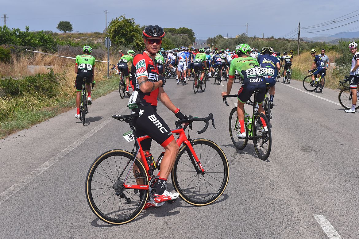 Nicolas Roche (BMC) waits after a crash