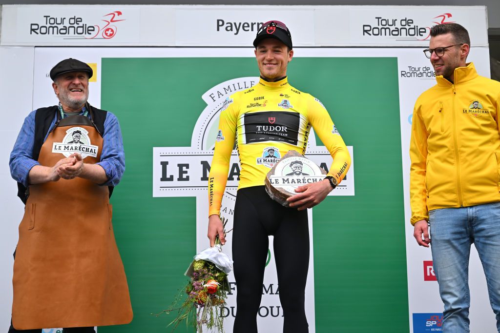 PAYERNE SWITZERLAND APRIL 23 Maikel Zijlaard of The Netherlands and Tudor Pro Cycling Team celebrates at podium as Yellow Leader Jersey winner during the 77th Tour De Romandie 2024 Prologue a 228km individual time trial stage from Payerne to Payerne UCIWT on April 23 2024 in Payerne Switzerland Photo by Luc ClaessenGetty Images