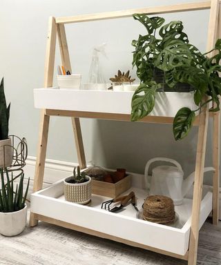 White 2-tier DIY plant stand with houseplants