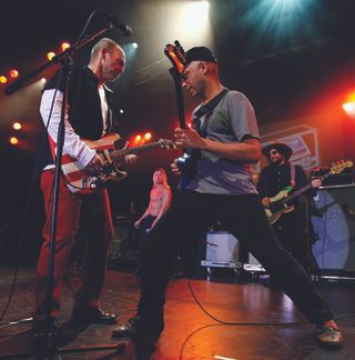 Wayne Kramer and Tom Morello perform during the 2009 Road Recovery benefit concert at the Nokia Times Square on May 1, 2009 in New York City. (Photo by Joe Kohen/WireImage)