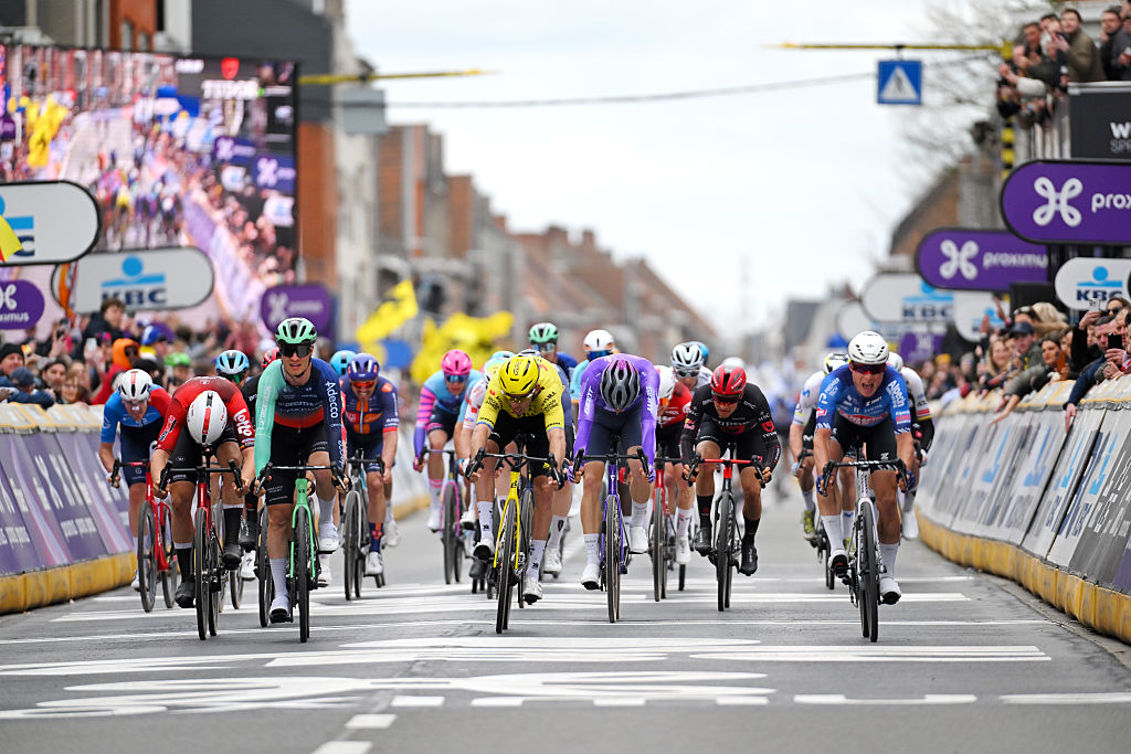 WEVELGEM, BELGIUM - MARCH 29: (L-R) Arnaud De Lie of Belgium and Team Lotto Intermarch&amp;eacute;, Tobias Lund Andresen of Denmark and Team Decathlon CMA CGM, Matteo Trentin of Italy and Team Tudor Pro Cycling, Christophe Laporte of France and Team Visma | Lease a Bike, Robert Donaldson of Great Britain and Team Jayco AlUla and race winner Jasper Philipsen of Belgium and Team Alpecin-Premier Tech sprint at finish line during the 88th In Flanders Fields - From Middelkerke to Wevelgem 2026 - Men&amp;amp;apos;s Elite a 240.8km one day race from Middelkerke to Wevelgem / #UCIWT / on March 29, 2026 in Wevelgem, Belgium. (Photo by Tim de Waele/Getty Images)