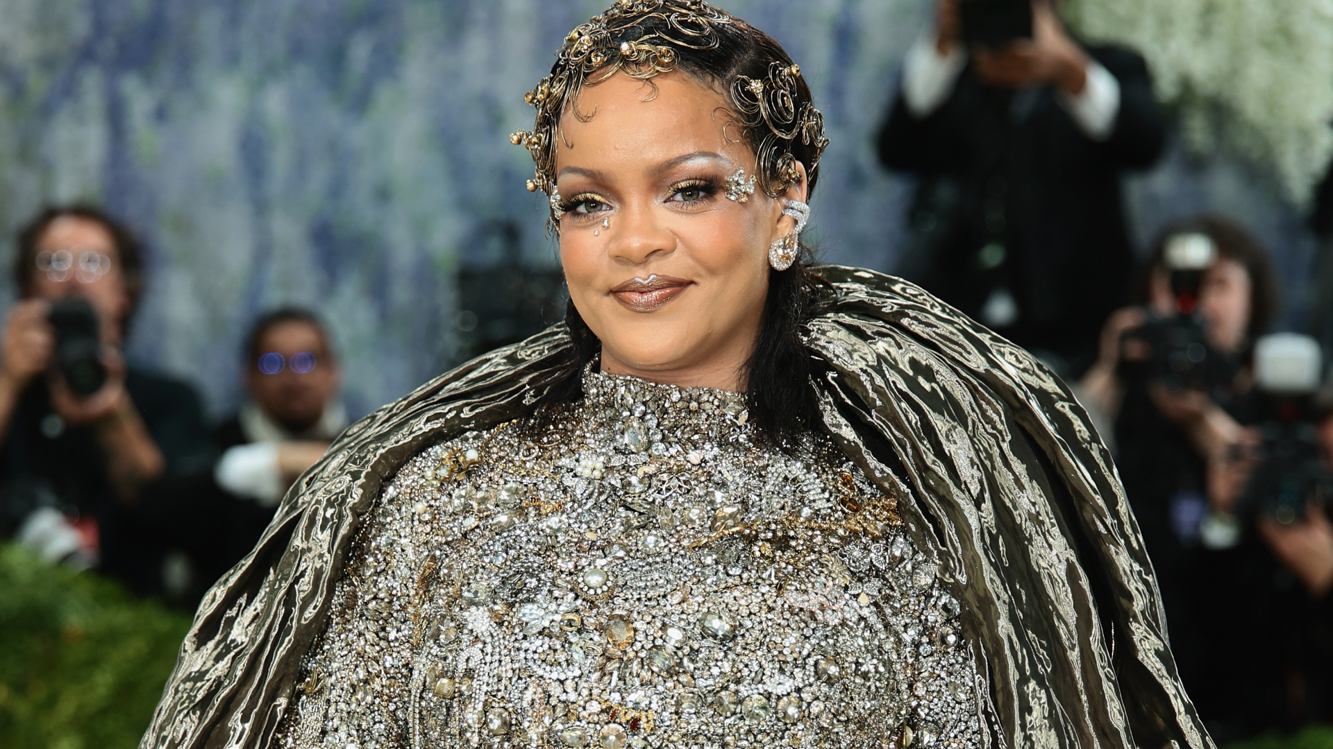 Rihanna wearing maison margiela at the met gala before wearing high-vamp flats
