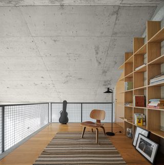Mezzanine study and library at Portuguese farm house by NaMora House