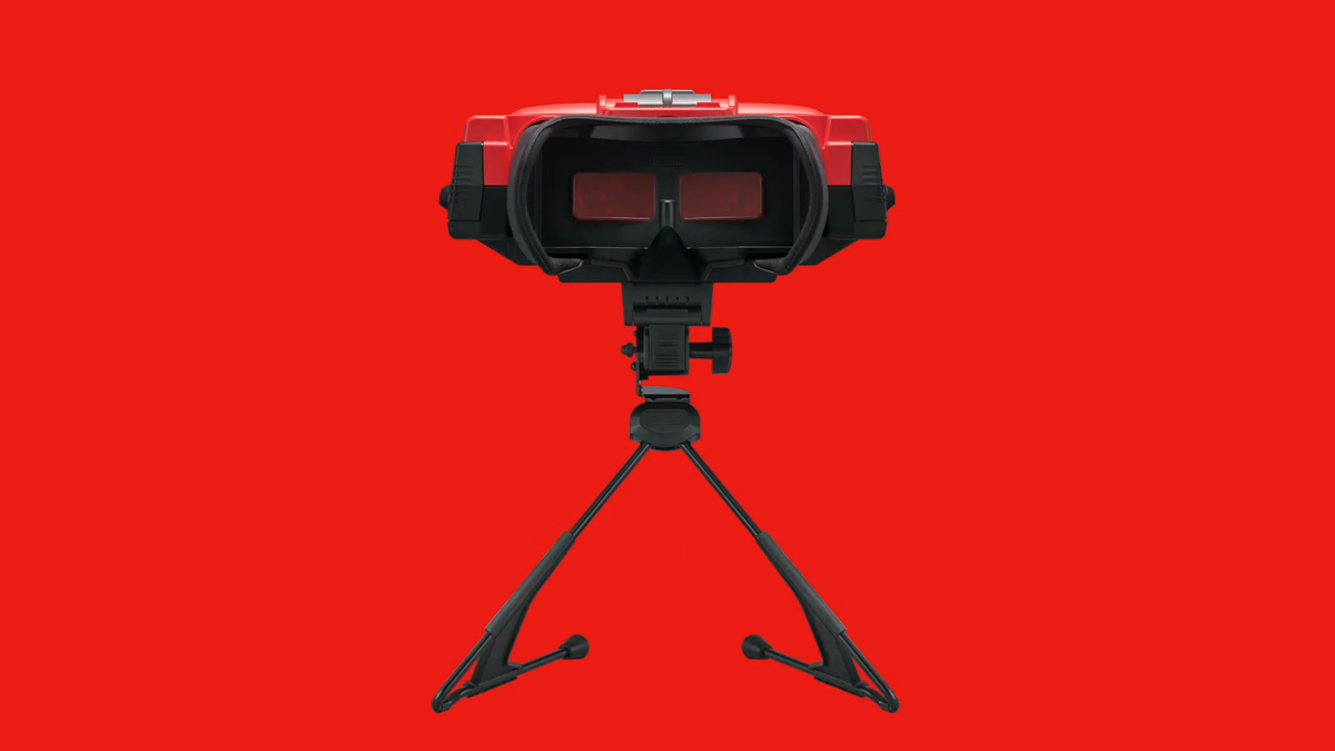 Virtual Boy headset with inside of goggles facing forward and red backdrop.