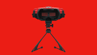 Virtual Boy headset with inside of goggles facing forward and red backdrop.