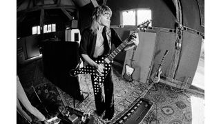 Randy Rhoads with his 'chip pan' pedalboard