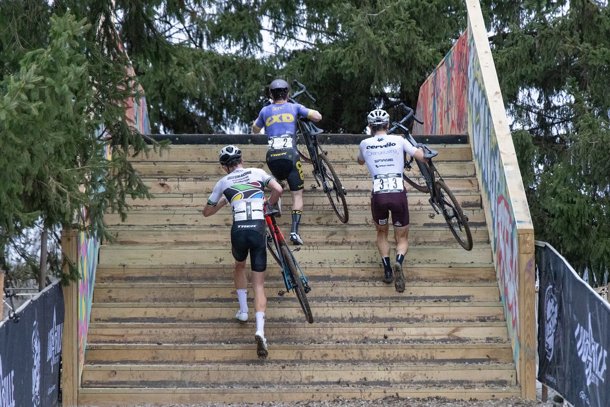 Strohmeyer, Funston and Brenner tackle the stairs on the flyover for the final time.