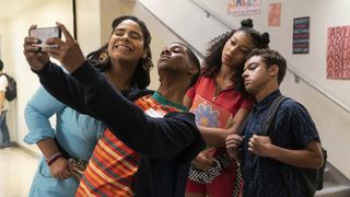 The cast of On My Block pose for a group selfie