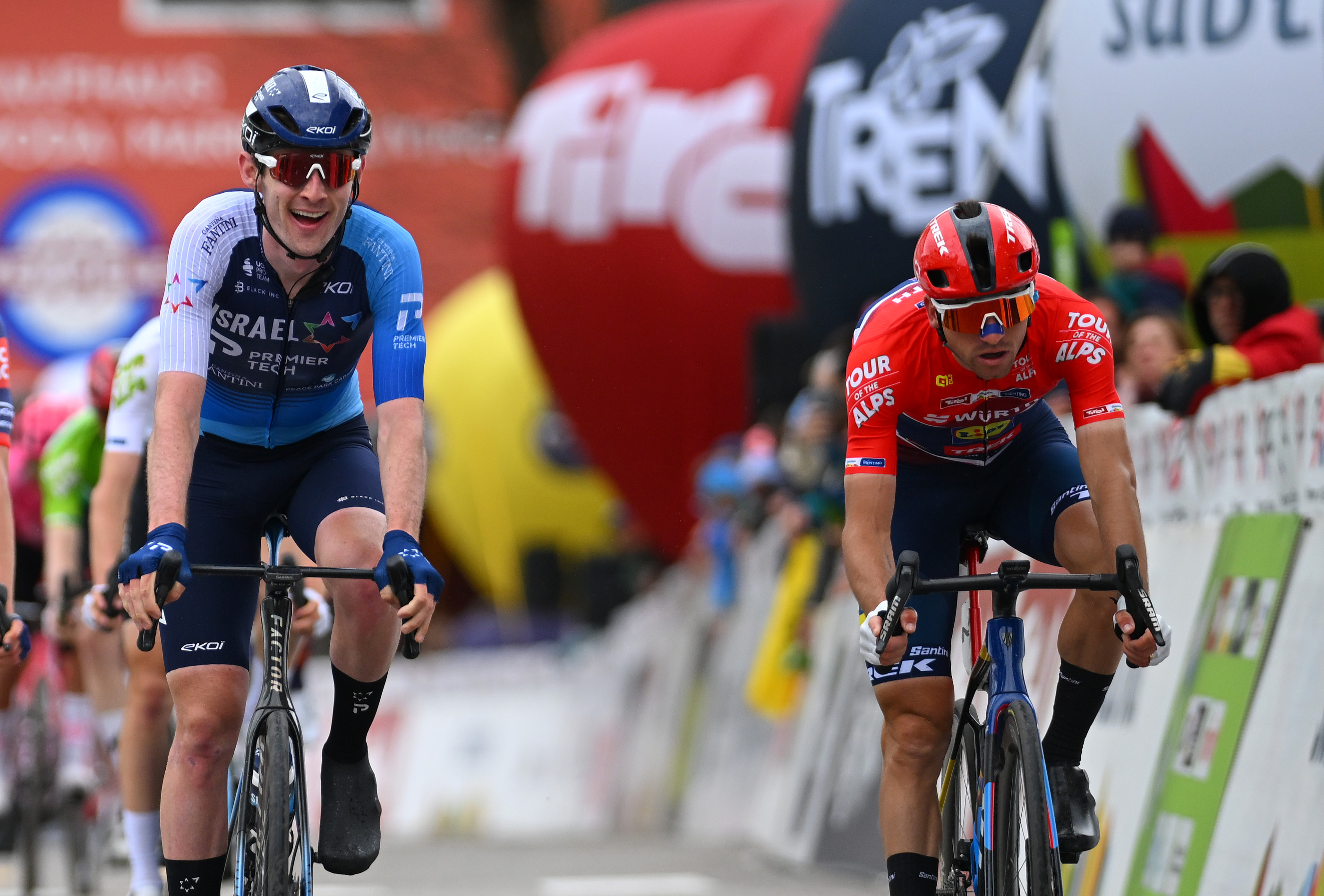 INNICHEN, ITALY - APRIL 23: (L-R) Jai Hindley of Australia and Team Red Bull - BORA - hansgrohe, Derek Gee of Canada and Team Israel - Premier Tech and Giulio Ciccone of Italy and Team Lidl - Trek - Red Points Jersey cross the finish line during the 45th Tour of the Alps 2025, Stage 3 a 145.5km stage from Sterzing to Innichen - San Candido 1176m on April 23, 2025 in Innichen, Italy. (Photo by Tim de Waele/Getty Images)