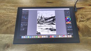 Wacom Movink review; a small pen display on a wooden table